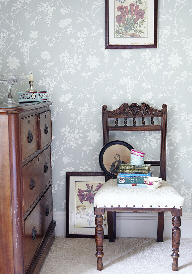 Antique chair with wooden chest of drawers in Oxfordshire home, England, UK