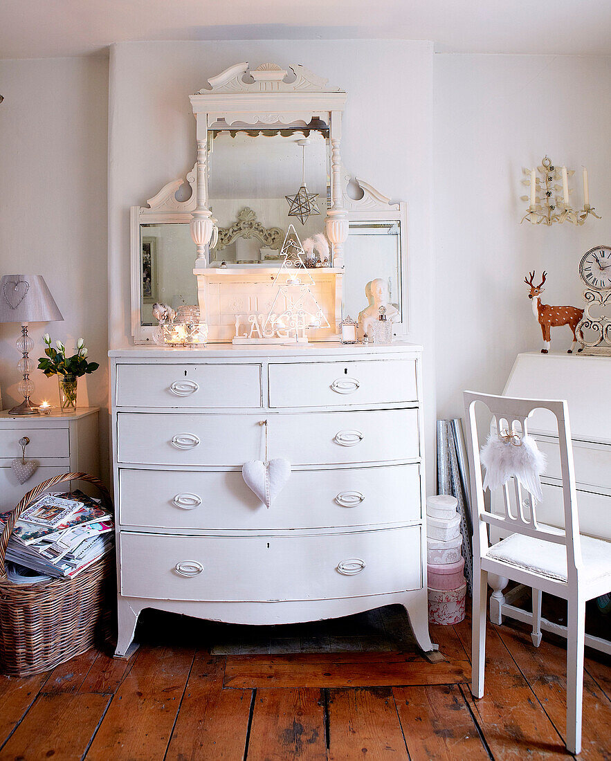 White painted chest of drawers in bedroom of Derbyshire farmhouse England UK