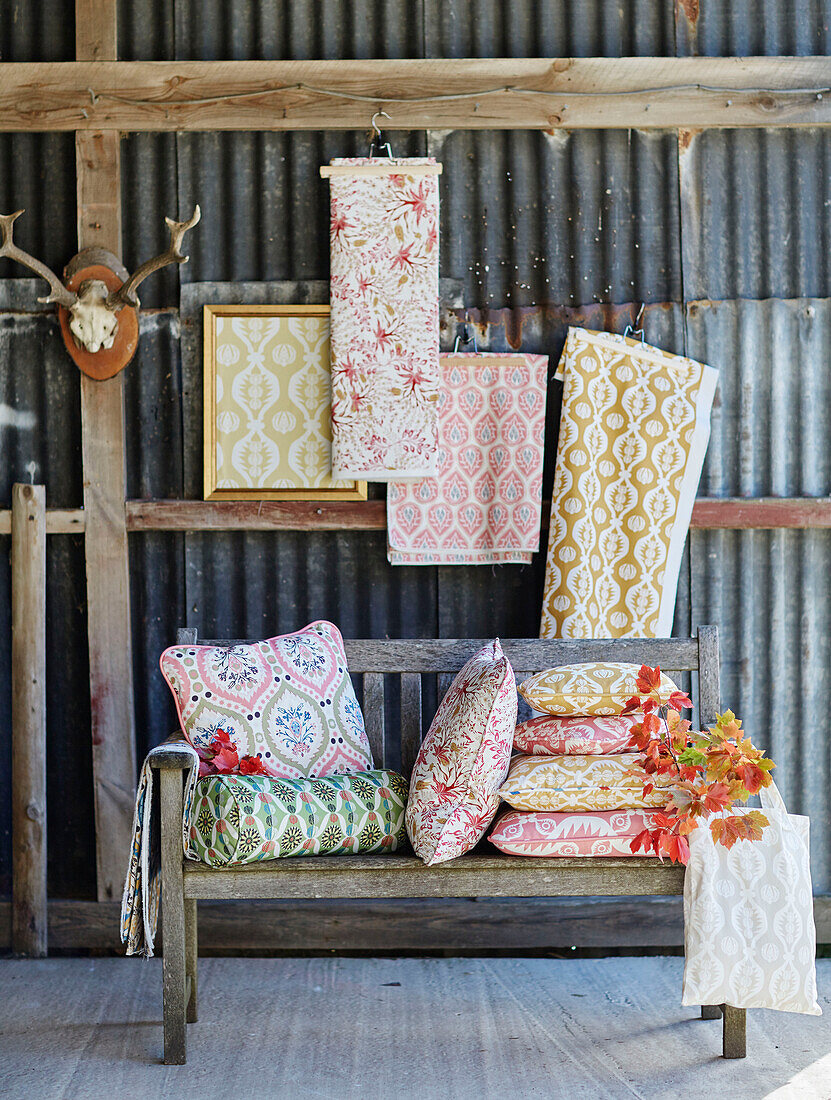 Assorted fabrics and cushion covers in Northumbrian textiles studio England UK