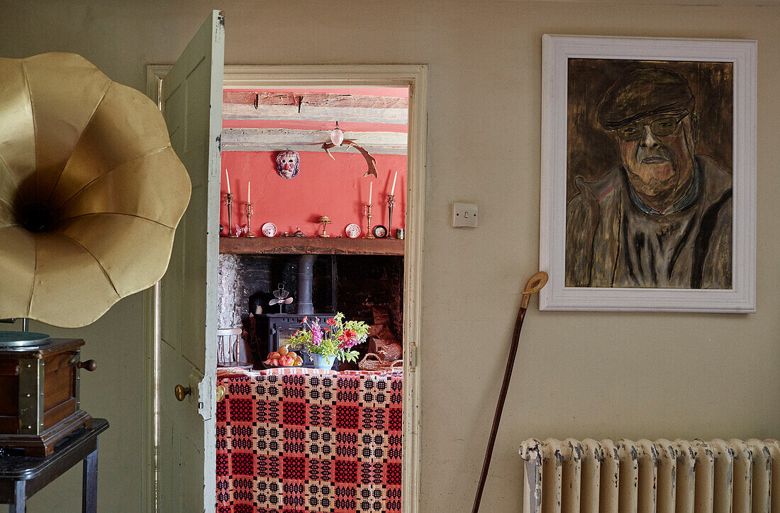 Gramophone and view through doorway in Powys cottage, Wales, UK