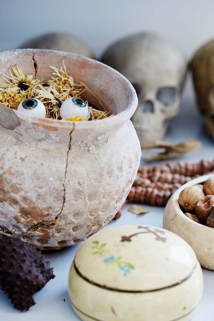 Eyeballs and dried flower sin cracked pot Sligo studio Ireland