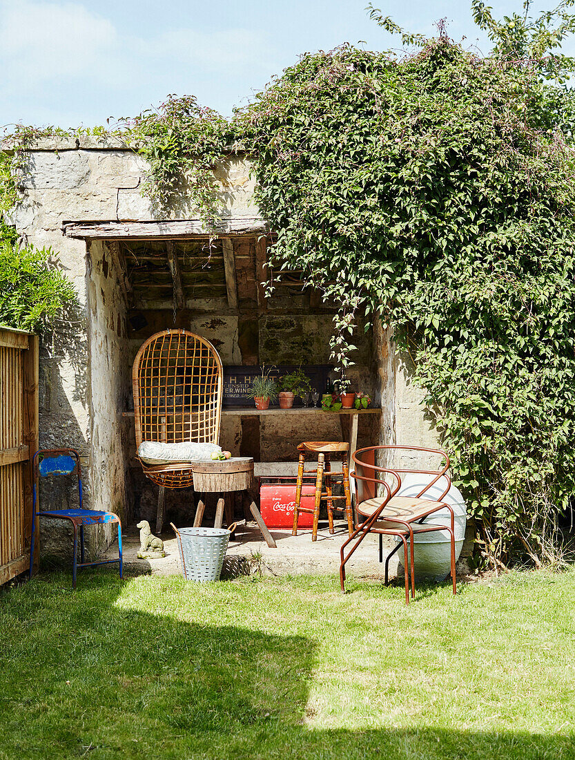 Chairs in old gardening shed North Yorkshire, UK