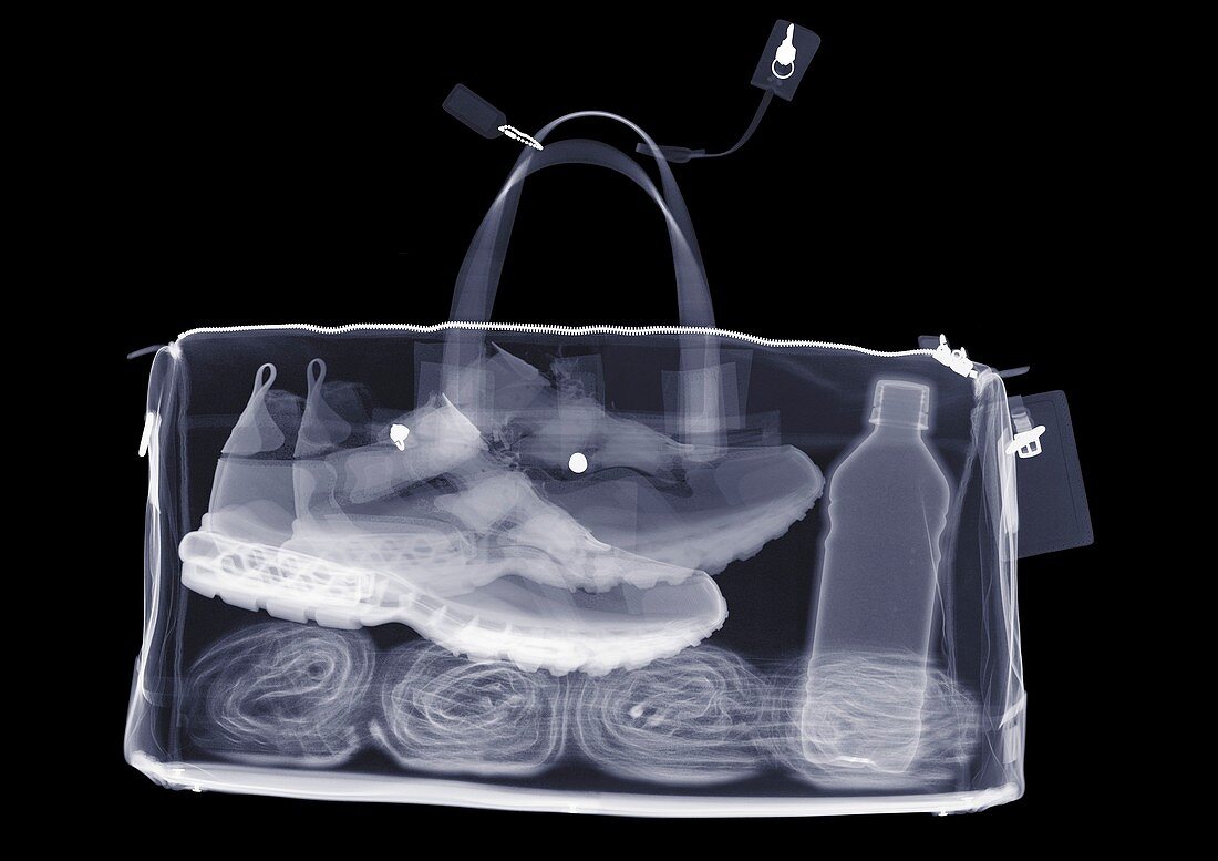 Sports bag with trainers towel and water, X-ray