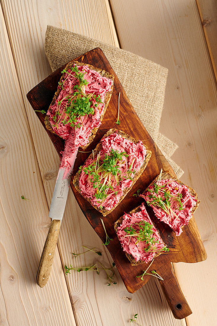 Seeded bread with beetroot spread and cress