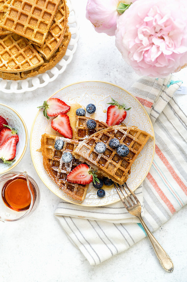 Healthy breakfast waffles with fresh berries