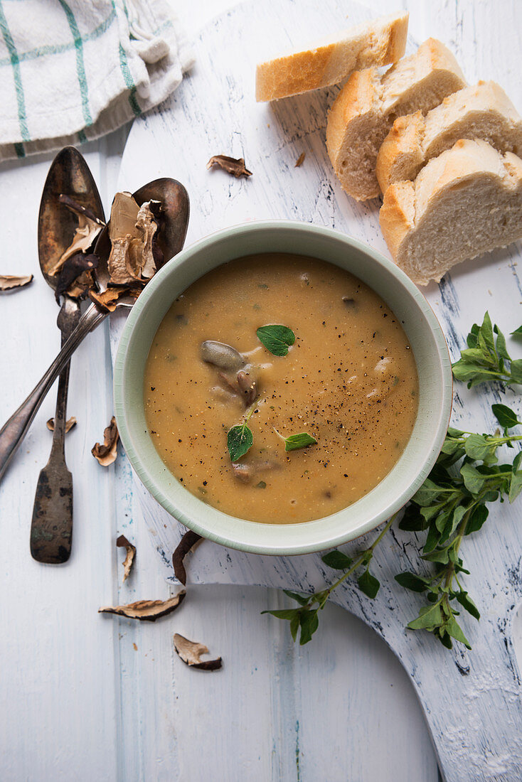 Vegan potato and wild mushroom soup with fresh marjoram
