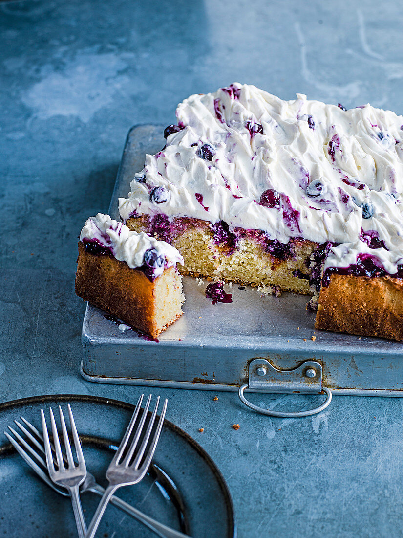 Lemon and blueberry poke cake