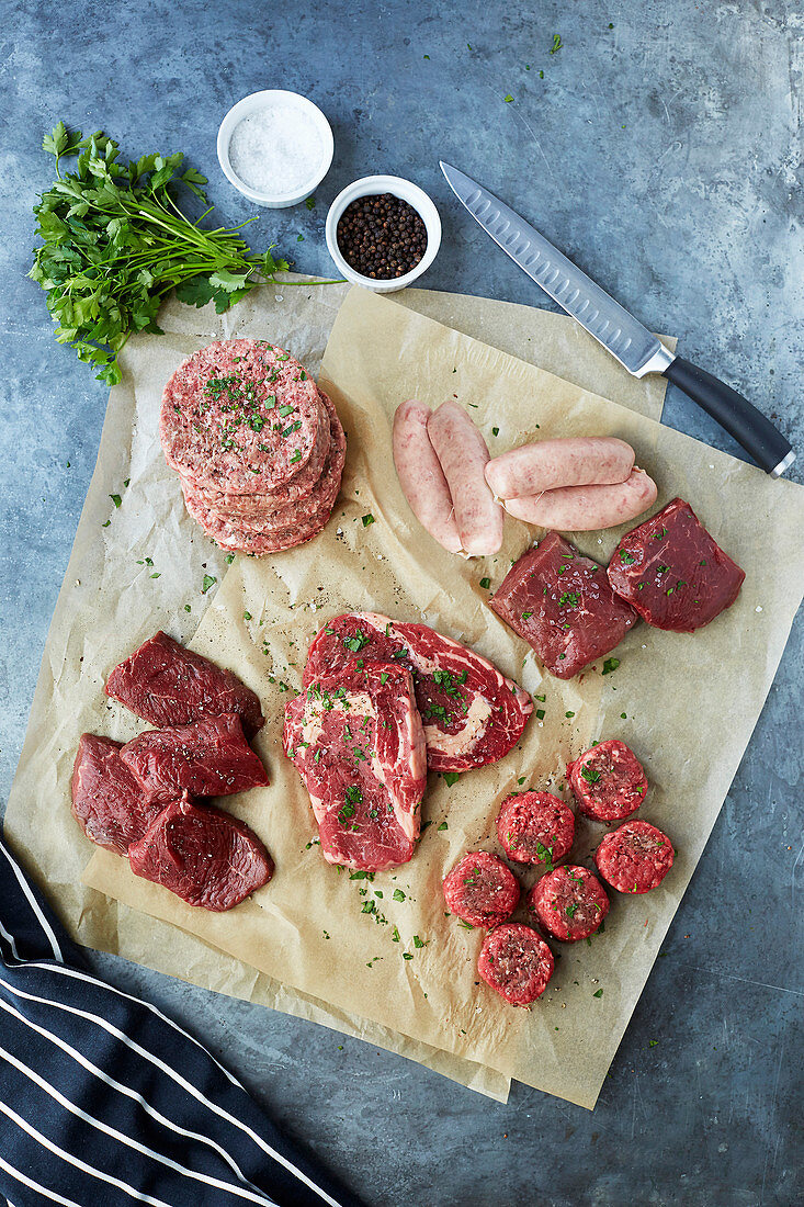 BBQ meat - ribeye steaks, pavé rump steaks and medallions, steak burgers, pork sausages