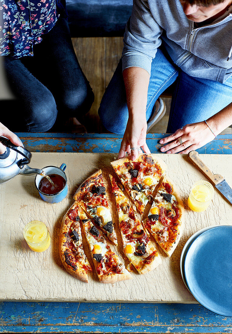 Breakfast pizza with eggs