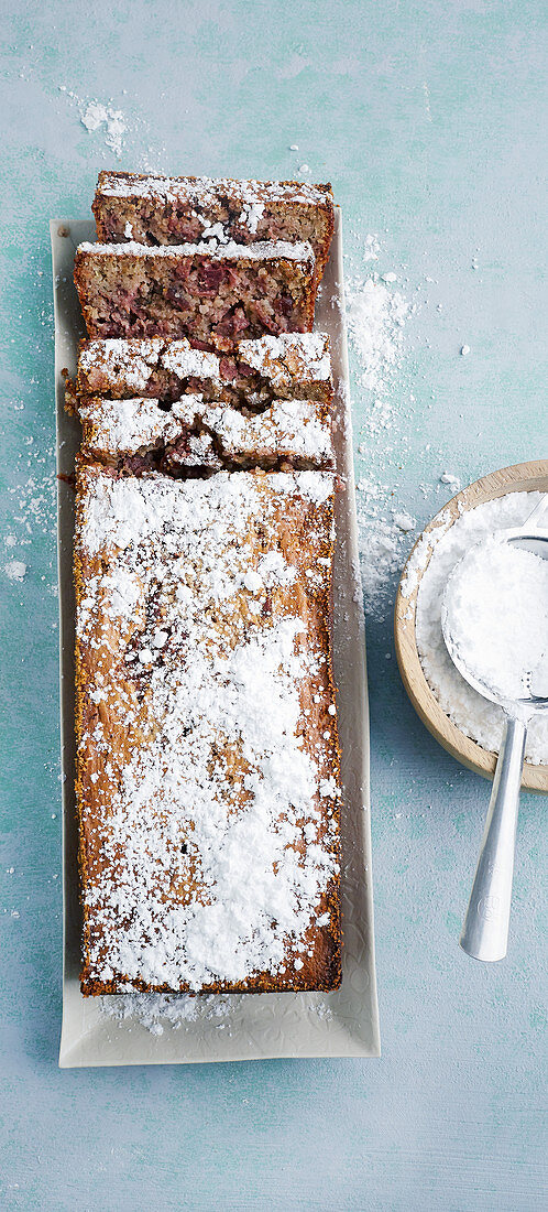 Bread cake with cherries and icing sugar