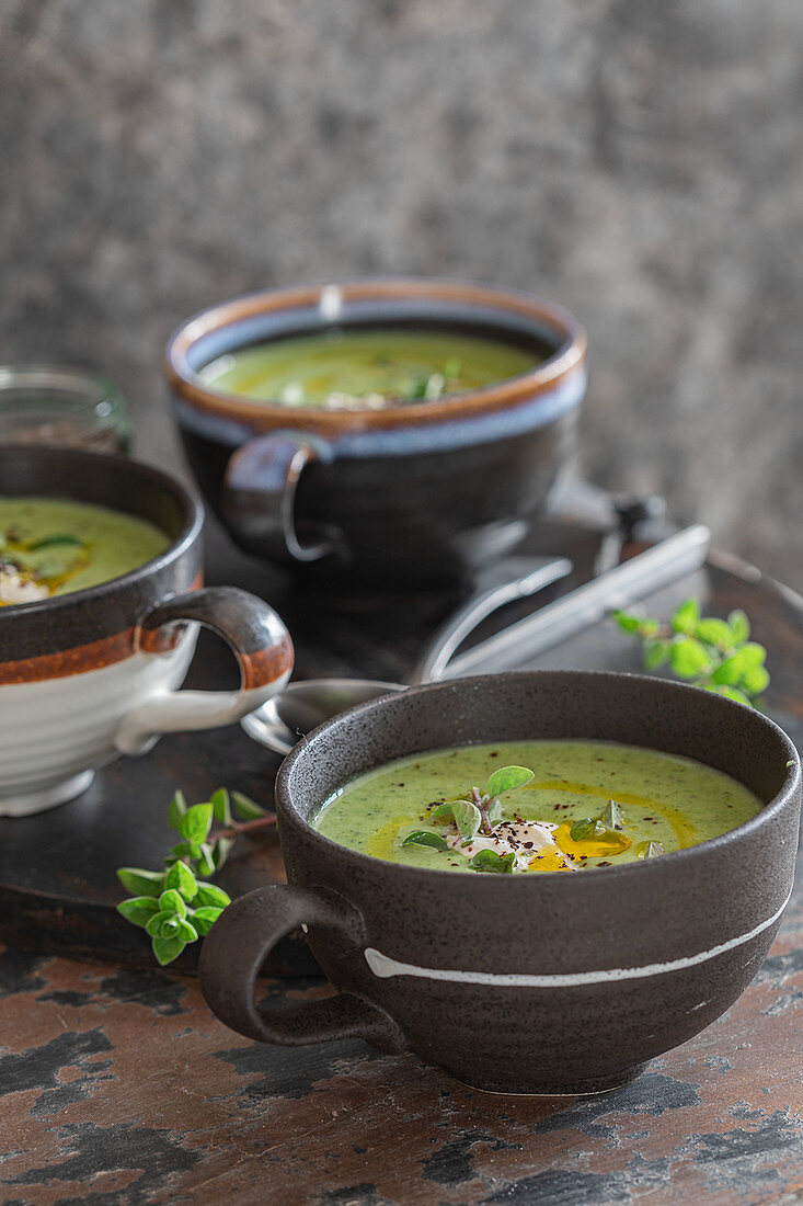 Creamy zucchini soup in cups