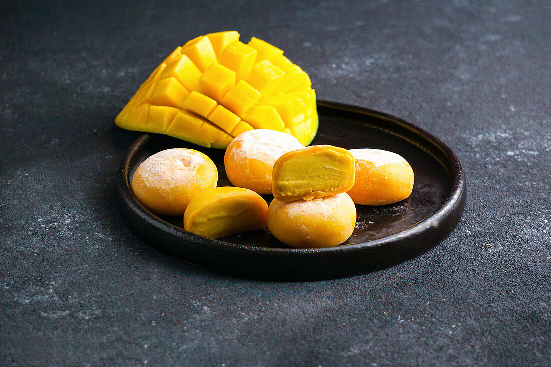 Mochi ice cream with mango (traditional Japanese rice sweets)