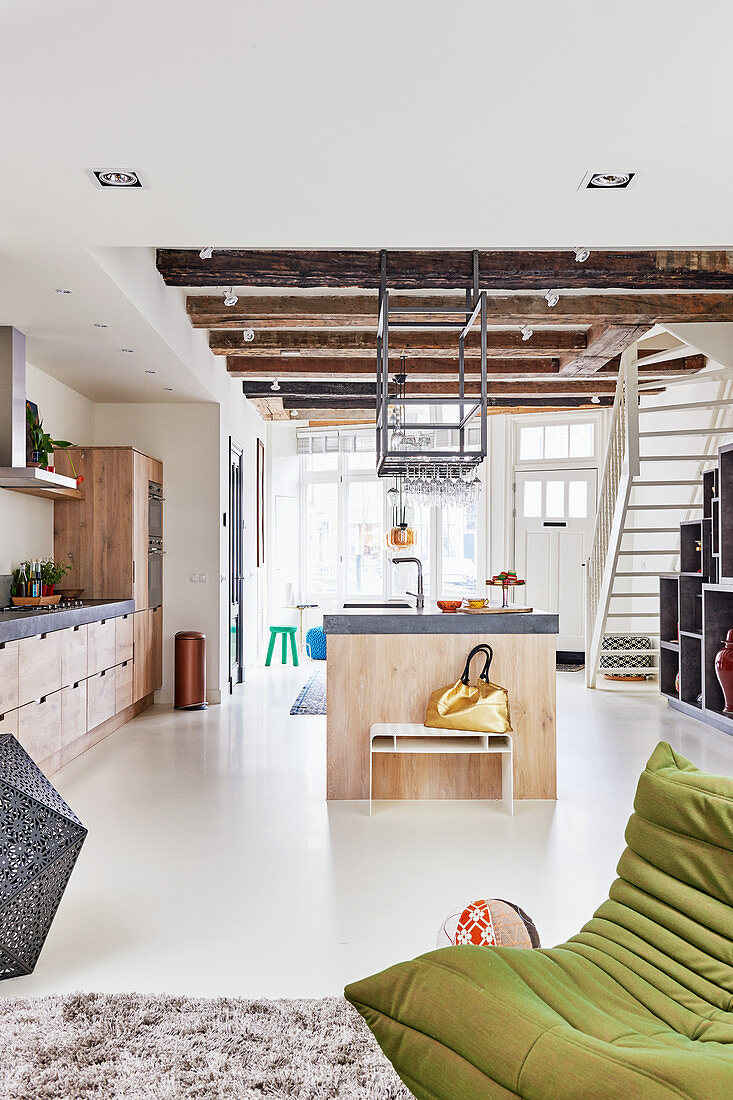 Custom kitchen with island counter in open-plan interior