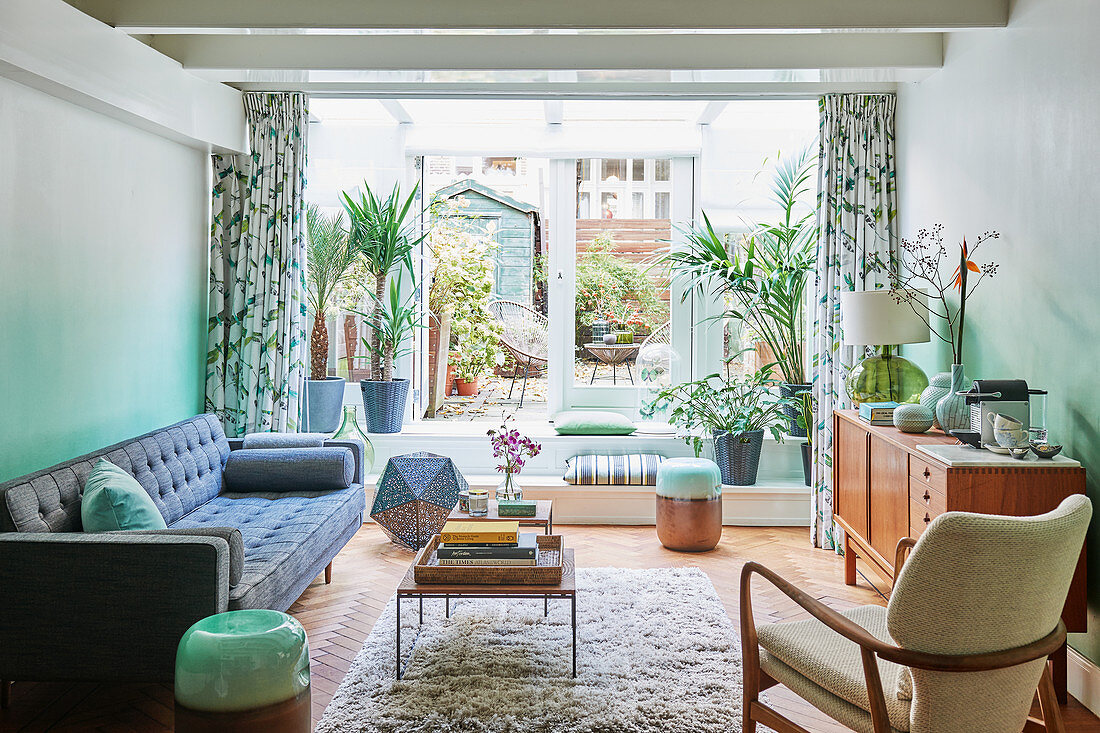 Mid-century modern living room with green and white ombré walls