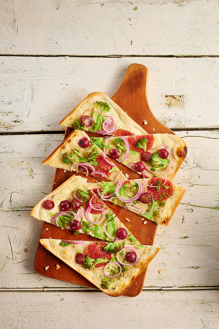 Tarte flambé with broccoli and red onions