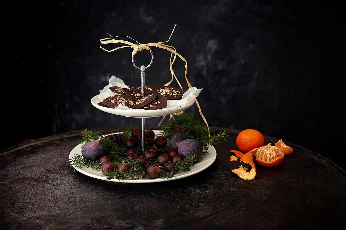 Chocolates and figs on a cake stand