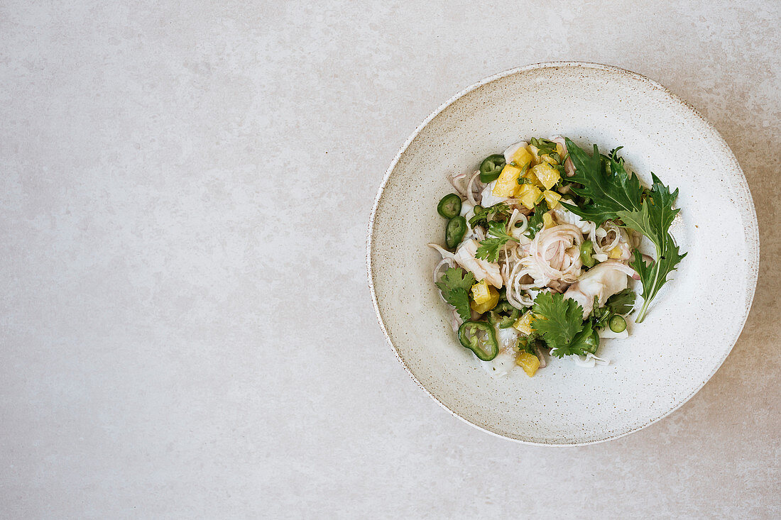 Bass ceviche with pineapple and coriander