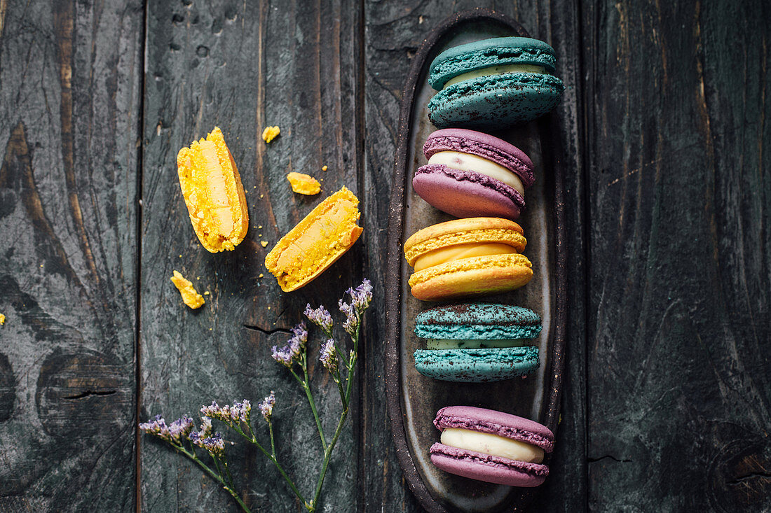 Colourful macarons in blue, lila and yellow