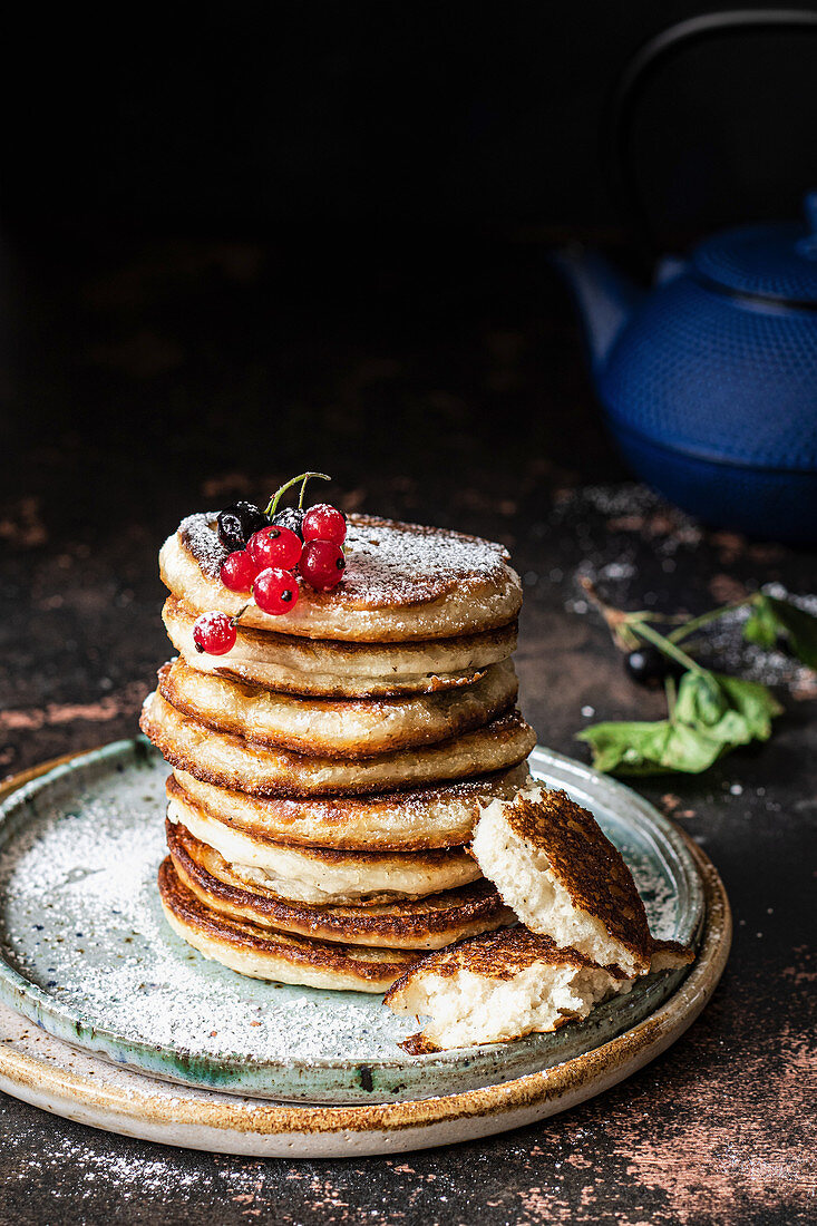Vegan and glutenfree pancakes with black and red currant