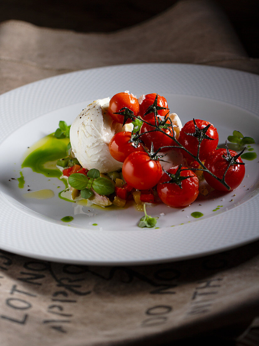 Tomato with mozzarella and roasted pappers