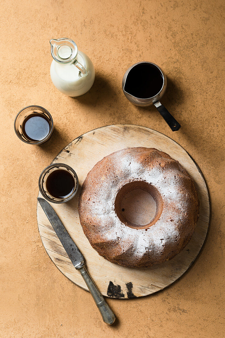 Bundt with coffee and milk top view