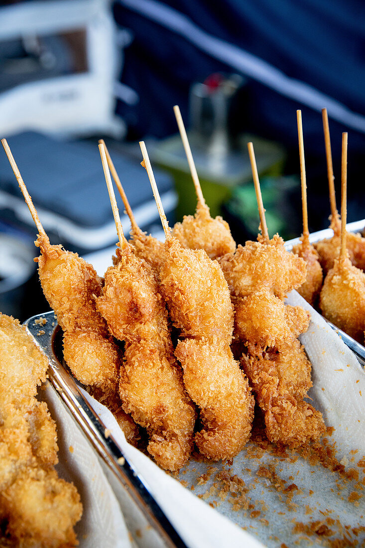 Breaded fried prawn skewers