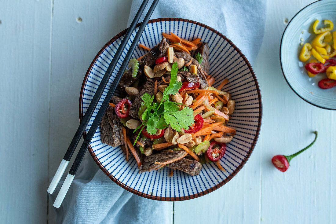 Asian beef salad with vegetables and peanuts