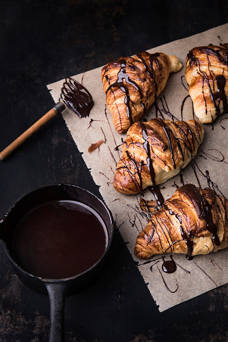 Chocolate croissants on baking paper