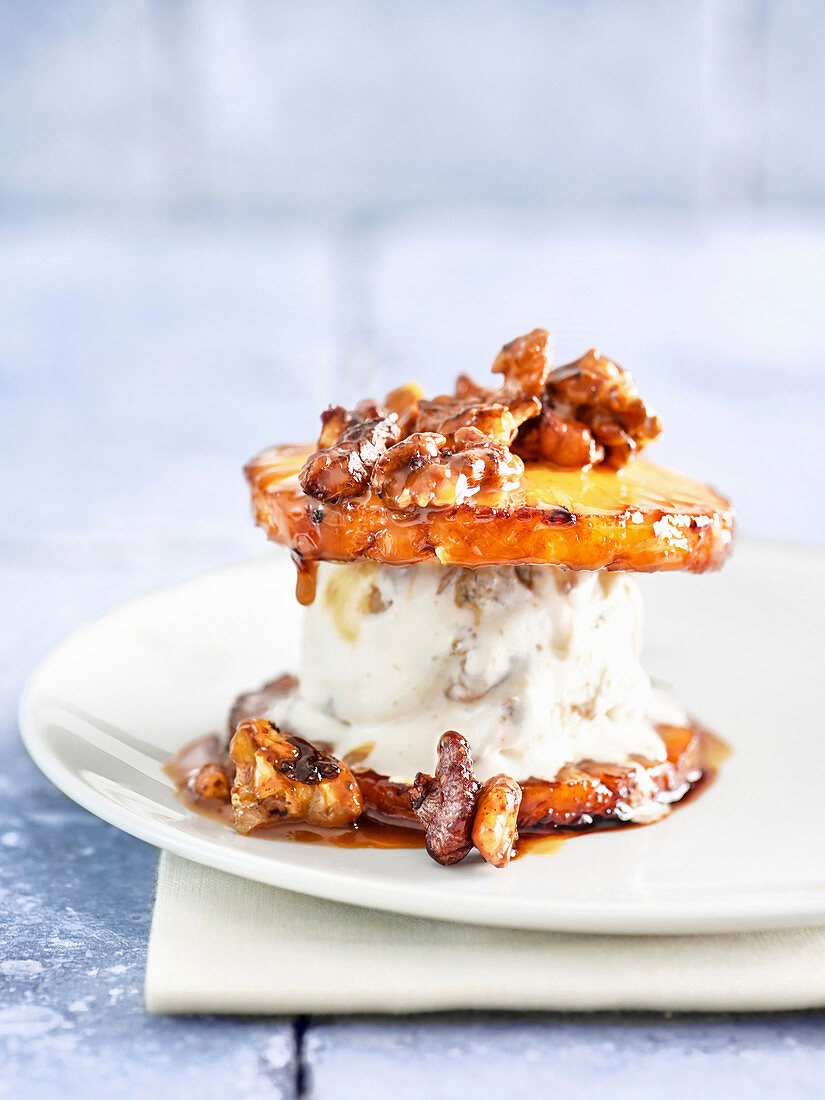 Grilled pineapple slices with vanilla-walnut ice cream and honey