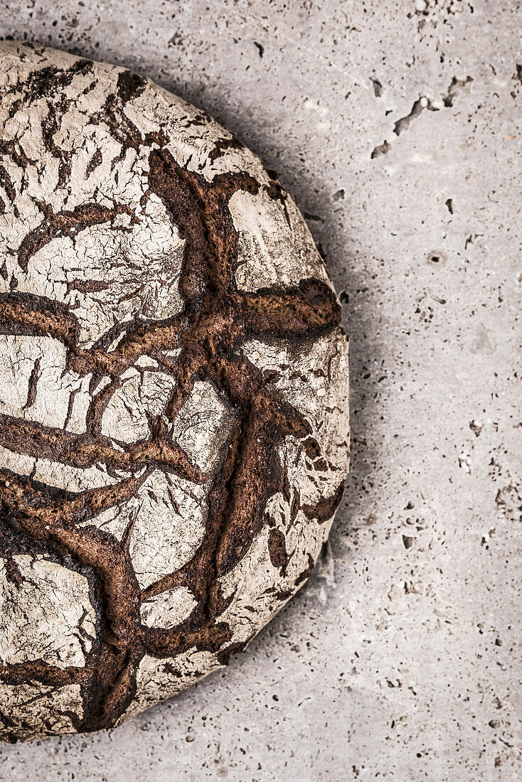 House bread on a light stone slab