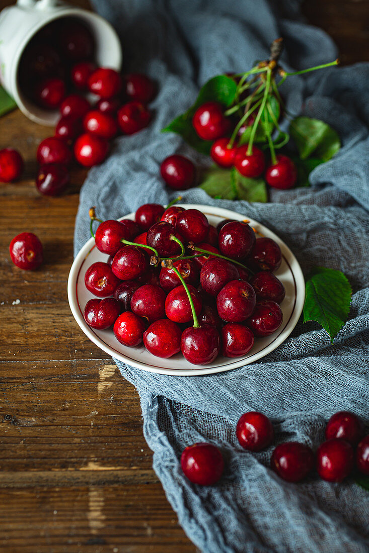 Sweet organic cherries on wooden table
