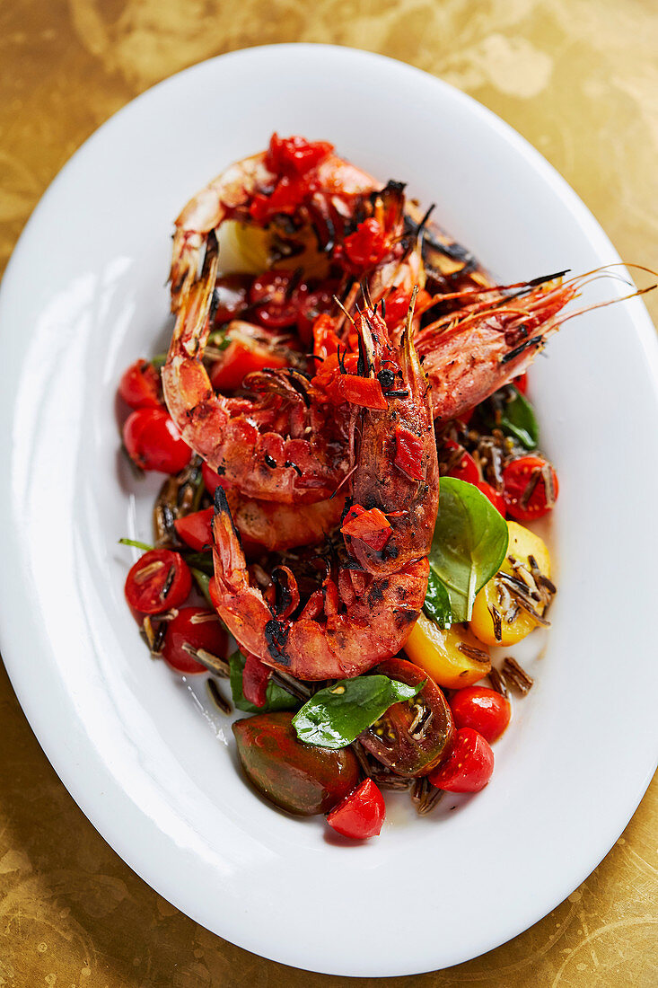 Chargrilled tiger prawns with black rice and roast chilli salsa