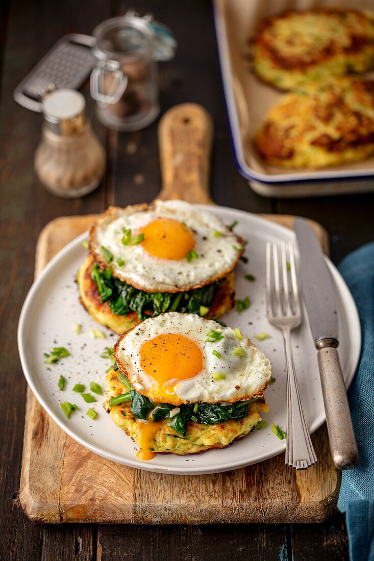 Potato cakes with spinach and fried egg