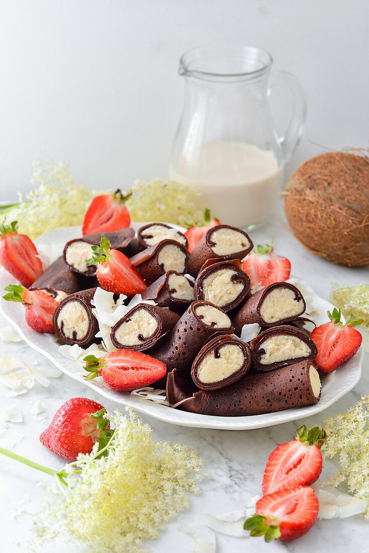 Chocolate pancakes with coconut filling