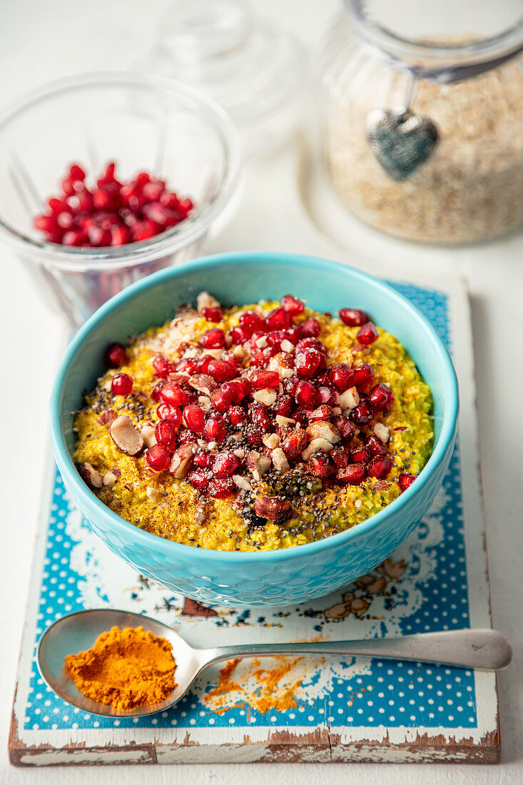 Porridge with tumeric and pomegranate