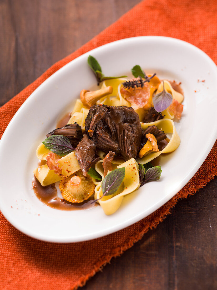 Beef cheeks with chanterelles and ribbon pasta (Italy)