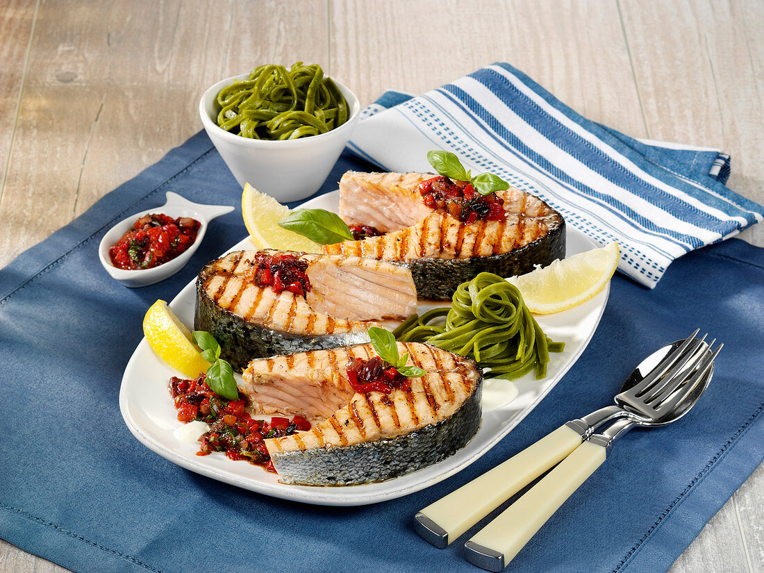 Salmon steaks with pepper and olive relish