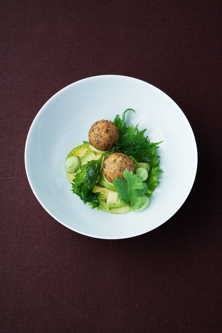 Peanut and marjoram croquettes with avocado and shiso