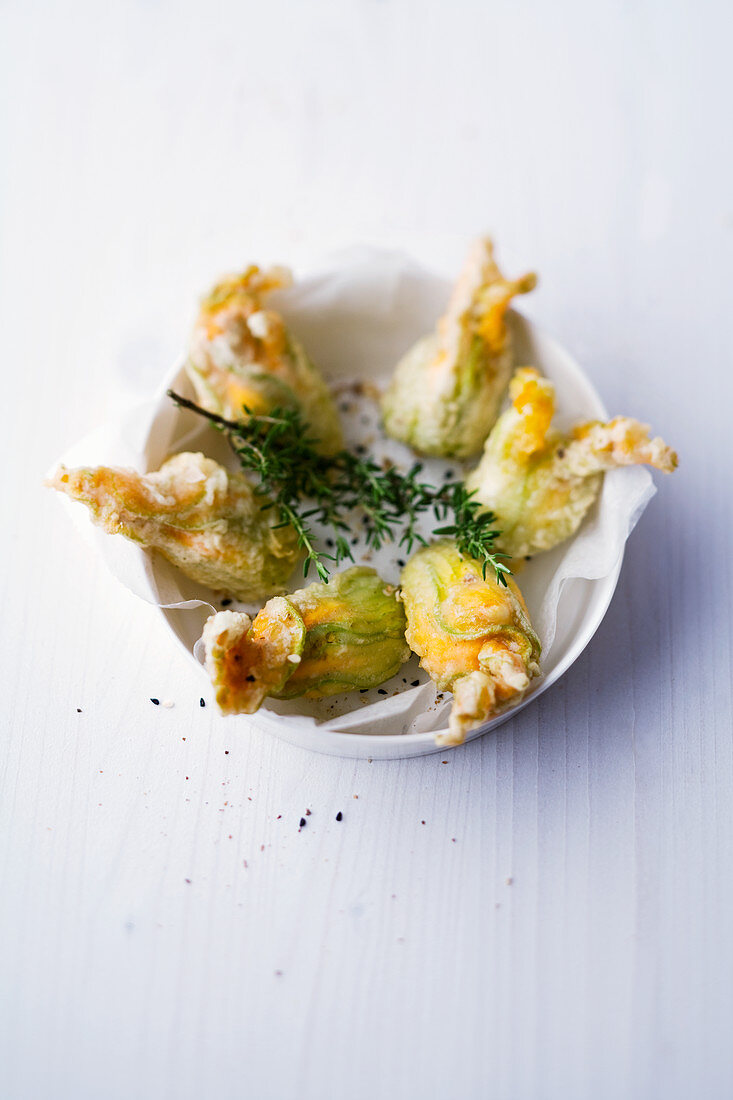 Stuffed courgette flowers with ricotta and grains of paradise