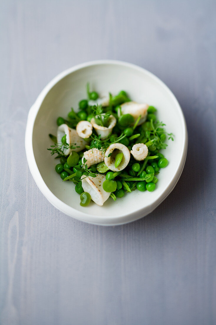 Pea salad with squid and anise