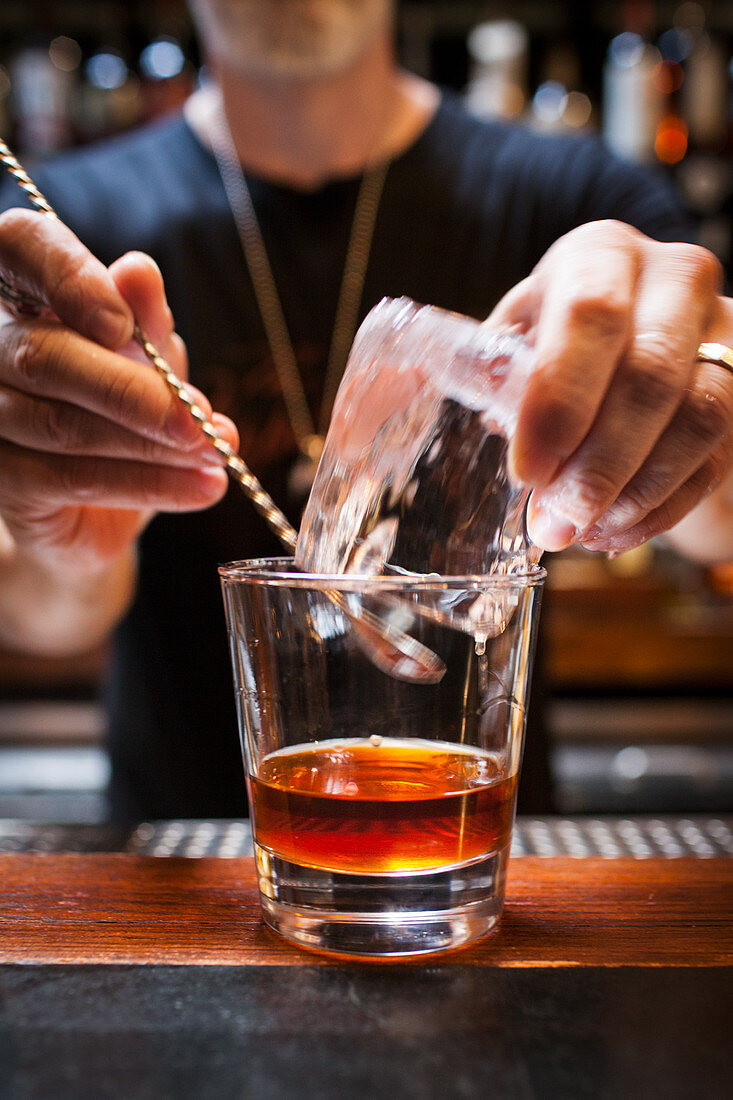 Making an Old-Fashioned cocktail