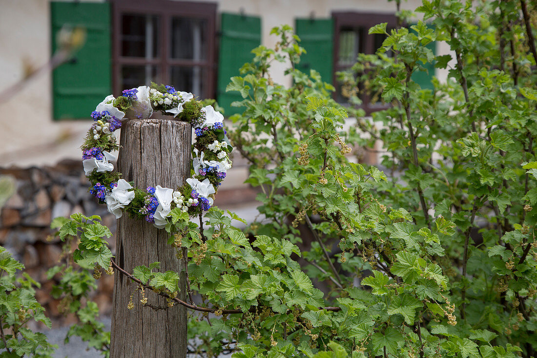 Wreath of hydrangea, lily-of-the-valley, forget-me-nots and moss