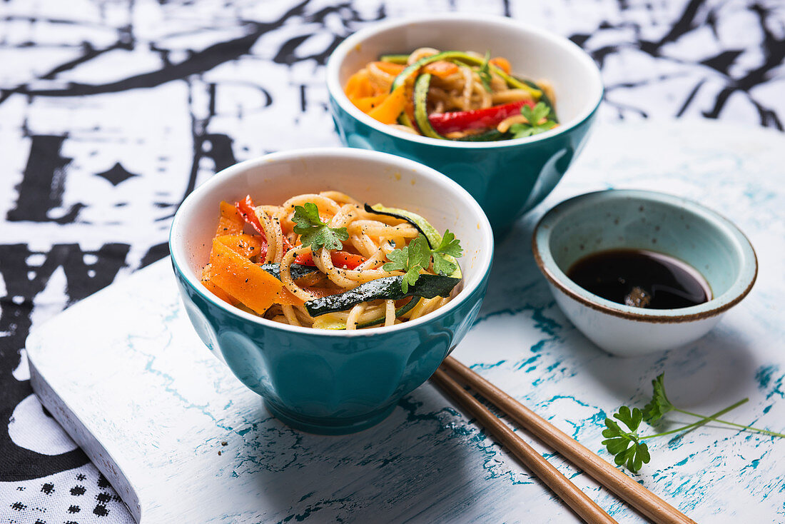 Oriental wheat noodles with fried vegetable strips