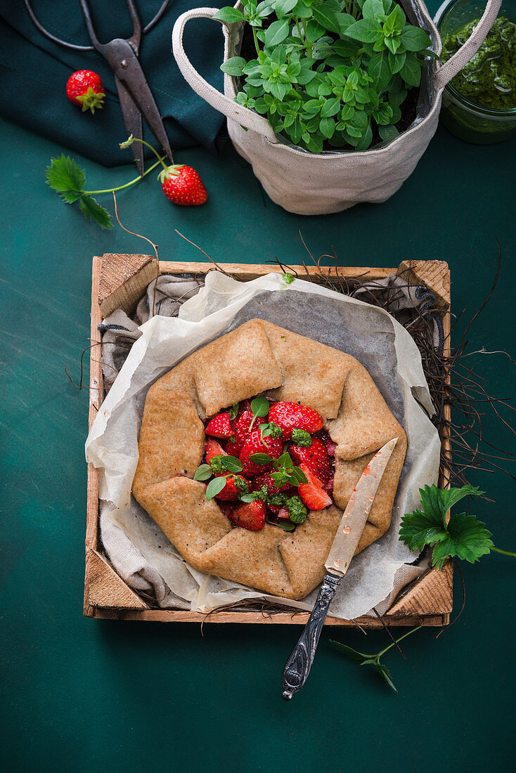 Savoury vegan spelt galette with strawberries and basil pesto