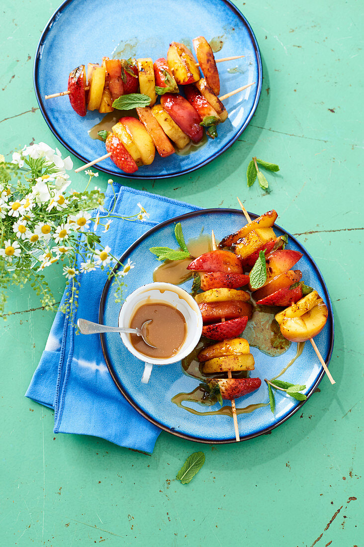 Grilled fruit skewers with salted caramel sauce