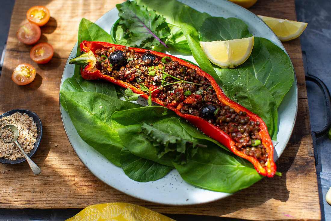 A pointed pepper filled with lentils, olives and dukkah