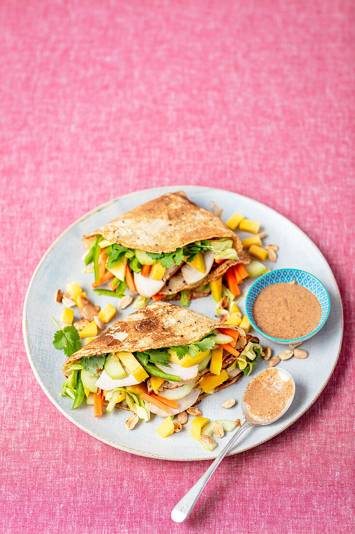 Pancakes with Thai salad - chicken, mango, peanutbutter dressing, cilantro