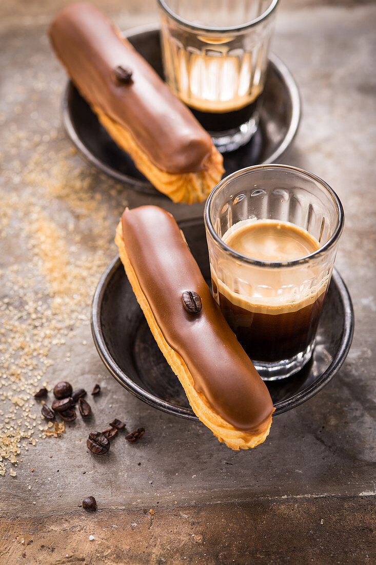 Eclairs with coffee cream and mocha beans