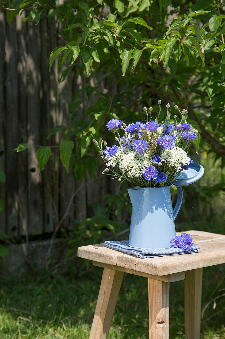 Wildflower bouquet of cornflowers, khella and ears of wheat