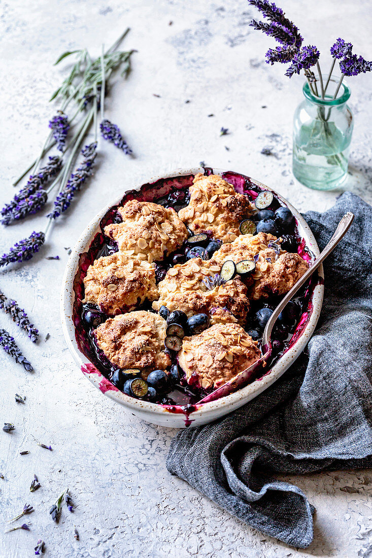 Blueberry cobbler with oat biscuits and lavender